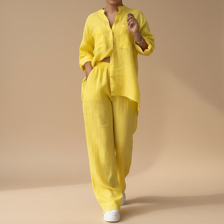 Relaxed fit women's button-down shirt and wide-leg pant combo. A comfortable two-piece set for any occasion.