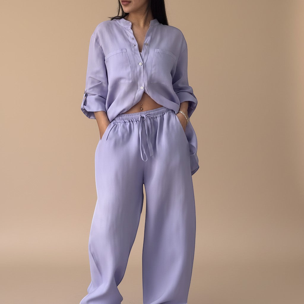 Matching two-piece women's outfit: relaxed button-down shirt & wide-leg pants. Perfect for summer casual wear.