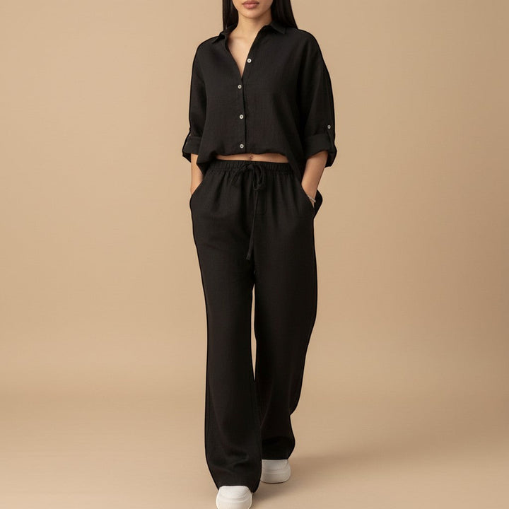 Cozy women's set with a relaxed button-down shirt and flowy wide-leg pants. Ideal for relaxed everyday style.