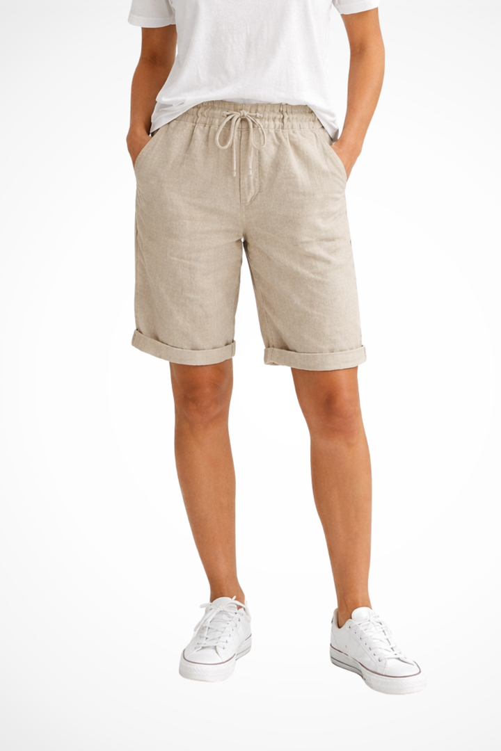 Women's relaxed fit capri pants in a neutral color, perfect for casual everyday comfort and summer wear.