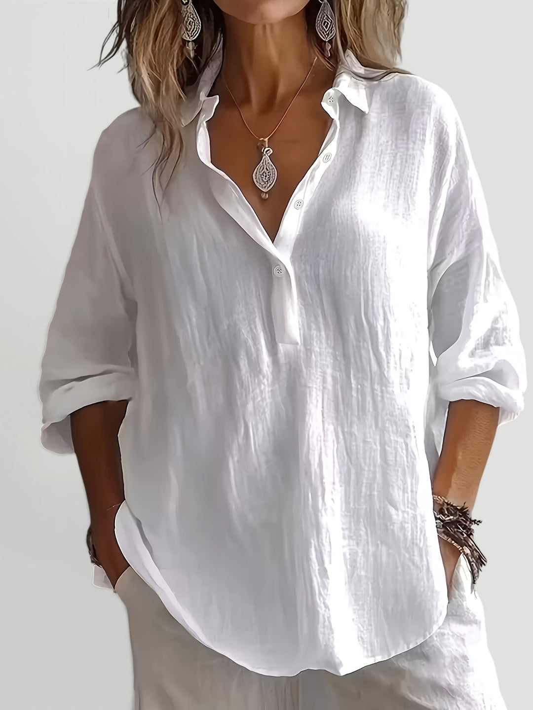Relaxed fit women's long sleeve shirt, elegant & comfortable, perfect for chic casual autumn outfits.