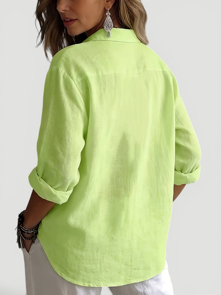 Elegant women's long sleeve blouse, relaxed fit, a stylish choice for spring, summer, or autumn fashion.