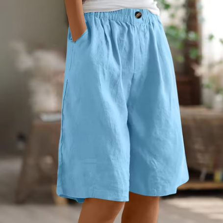 Model wearing women's relaxed fit casual shorts, showcasing summer comfort and everyday style.