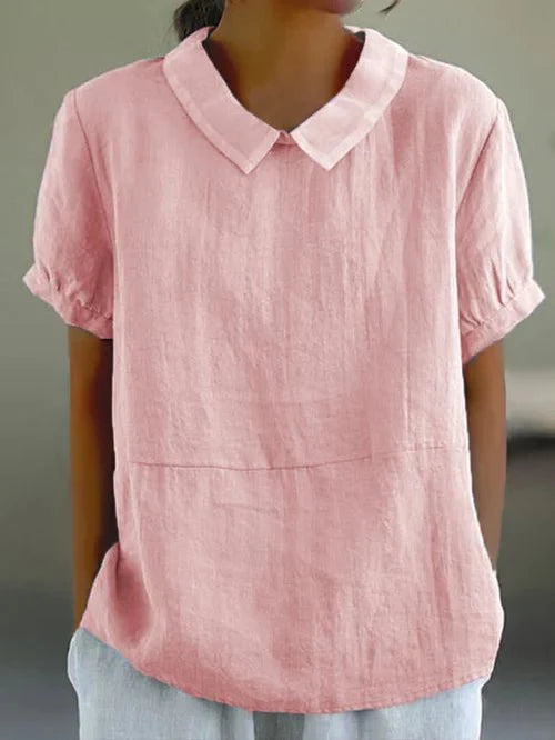 Comfortable women's relaxed-fit pullover blouse with a stylish collar & short sleeves. Chic ladies fashion for spring.