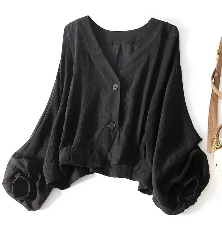Elegant casual women's blouse, cotton linen blend, with comfortable batwing sleeves & button detail.
