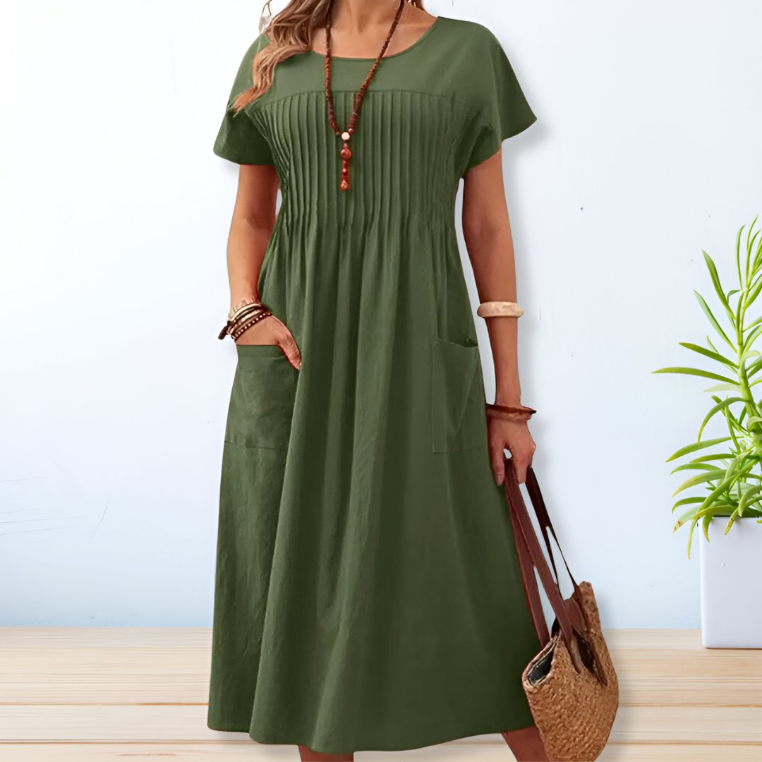 Women's relaxed fit day dress with tummy coverage, perfect for everyday wear. Comfortable short sleeve casual dress.