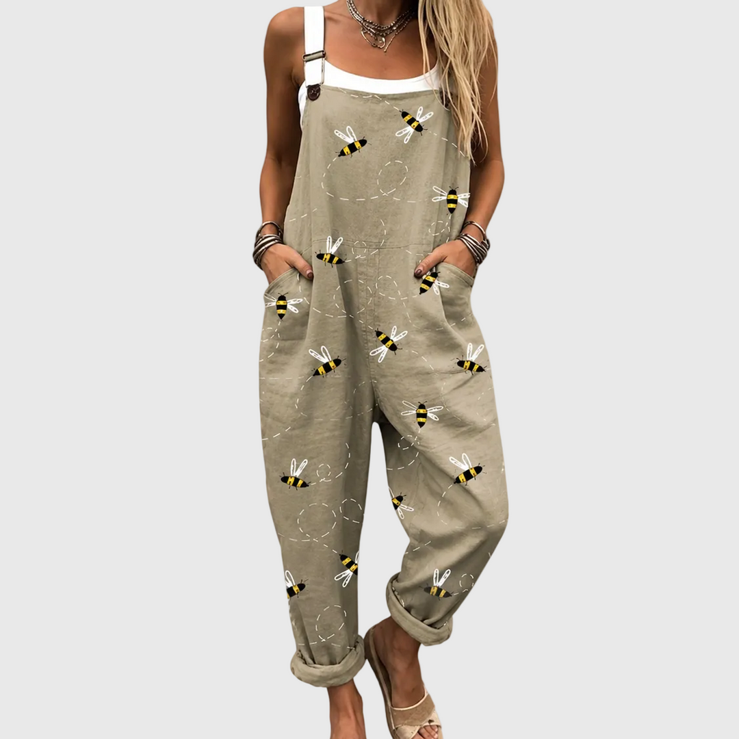 Women's relaxed fit denim overalls with delicate embroidered bee design, perfect for casual spring & summer wear.