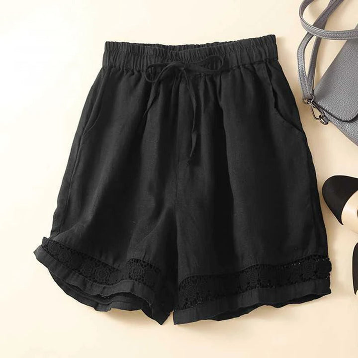 Stylish women's relaxed fit drawstring shorts, perfect for comfy everyday summer fashion.
