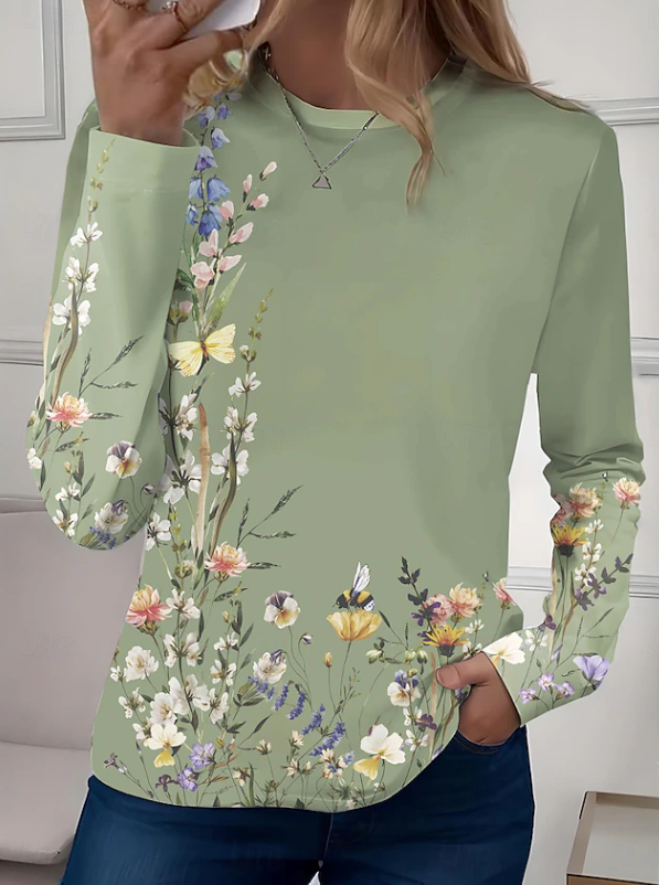 Women's relaxed fit floral long sleeve top with crew neck. Perfect casual blouse for everyday feminine style.