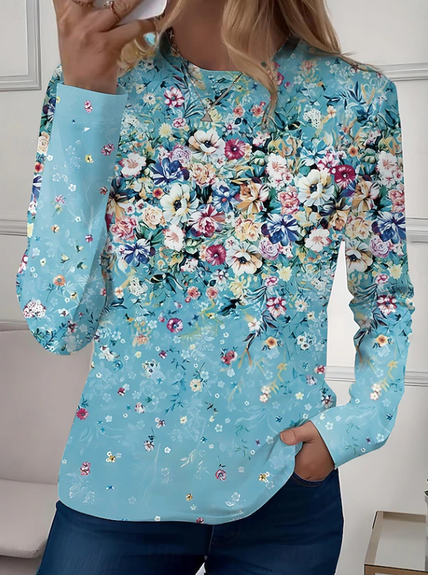Versatile women's long sleeve floral blouse, a relaxed crew neck top for casual and feminine everyday wear.