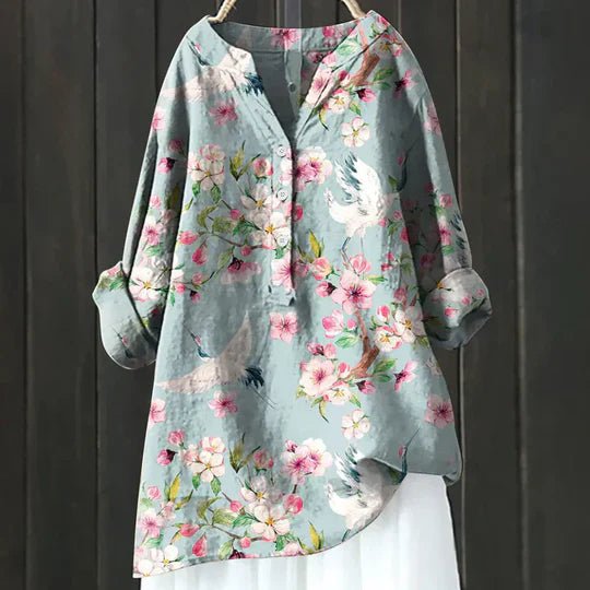 Women's relaxed-fit floral tunic top, perfect for effortless spring & summer casual wear.