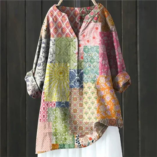Relaxed-fit women's floral tunic, a comfortable & versatile top for casual or dressed-up occasions.