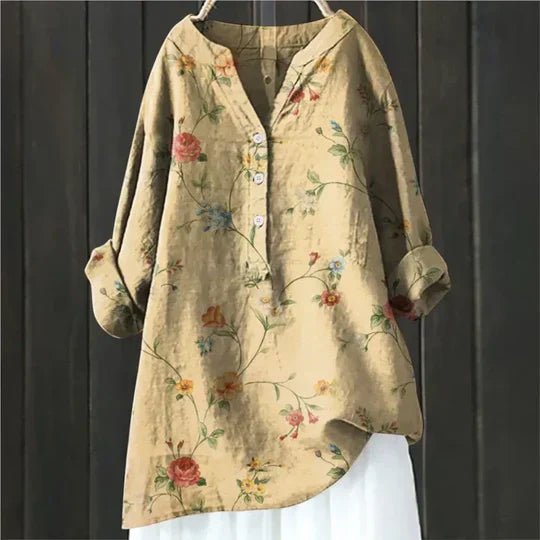 Patterned floral tunic top for women, featuring a relaxed fit for comfortable and effortless summer style.