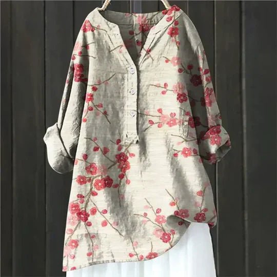 Vibrant floral patterned tunic top for women, offering a relaxed fit for ultimate comfort & spring fashion.