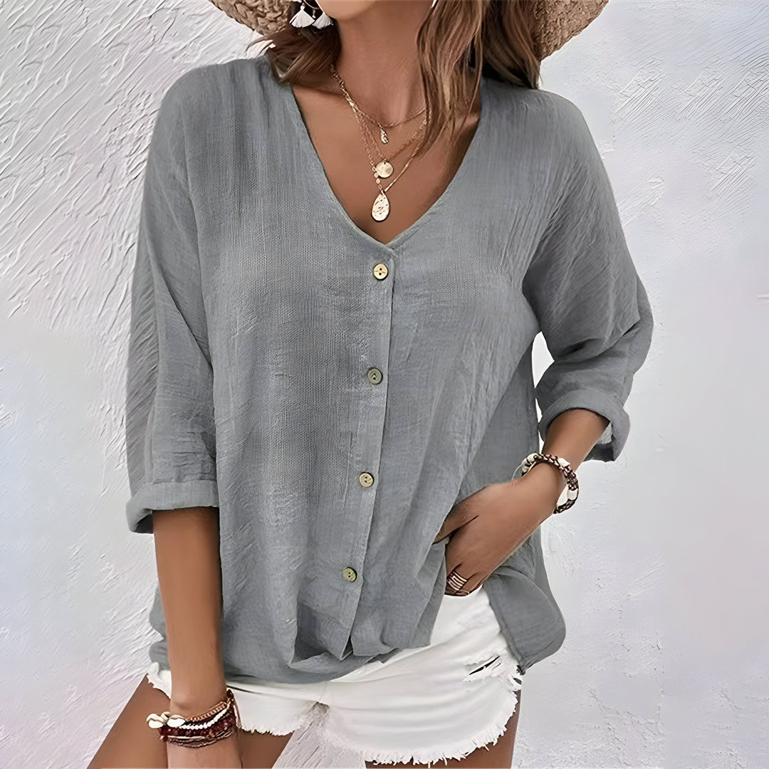 Khaki women's button-up blouse, a versatile relaxed fit top for smart casual and everyday wear.