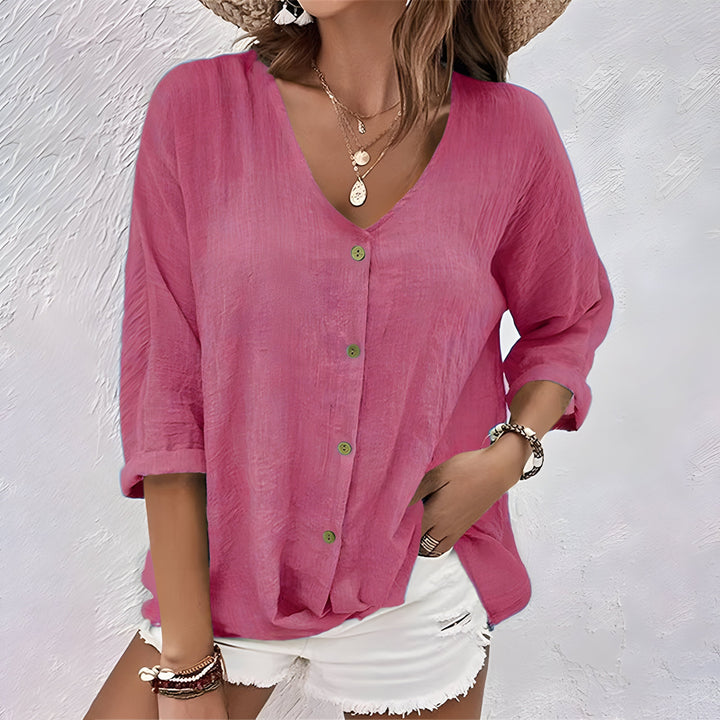 Relaxed fit women's button-up blouse, a long sleeve top for effortless, casual elegant everyday style.