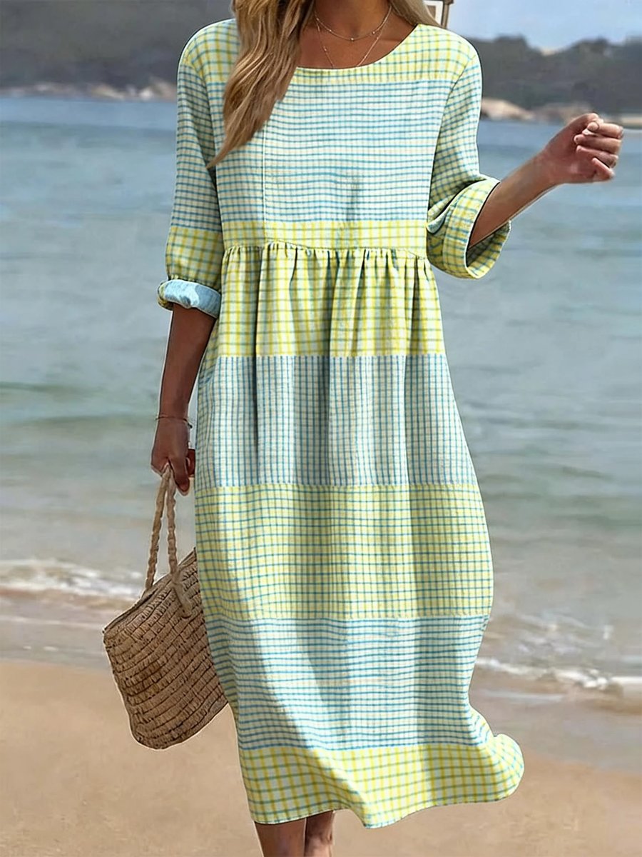 Women's relaxed-fit half-sleeve printed midi dress with a checked pattern, perfect for casual summer wear.
