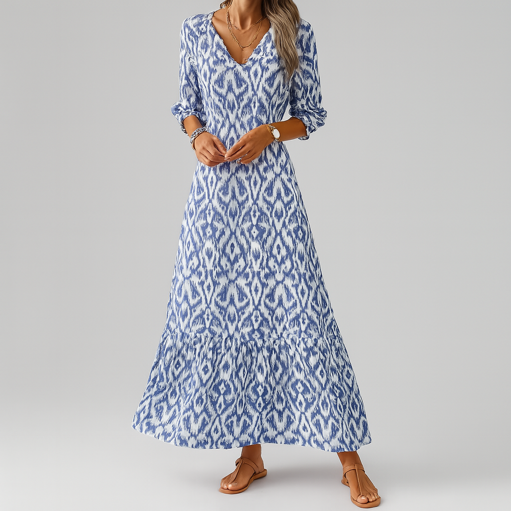Women's relaxed fit ikat print maxi dress with v-neck and 3/4 sleeves, perfect for bohemian summer fashion.