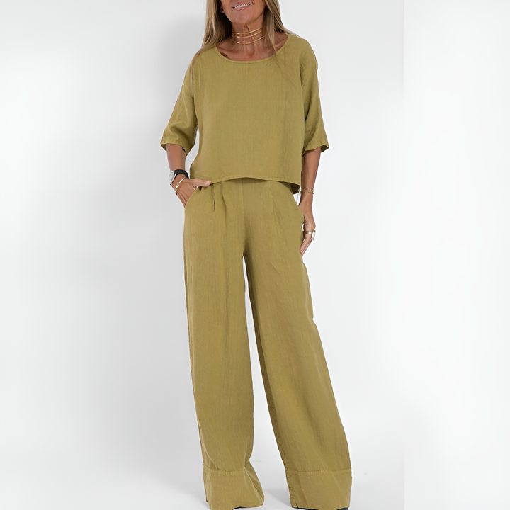 Chic women's linen blend two-piece set. Relaxed fit button-down top and wide-leg pants, versatile for loungewear.