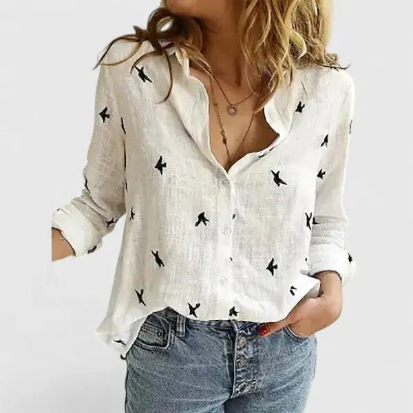 Chic women's long sleeve top. Relaxed fit linen button-down shirt with a classic lapel collar.
