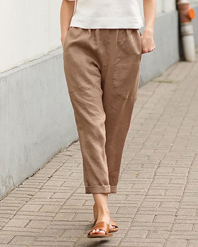 Breathable women's linen-cotton blend tapered pants with a relaxed fit and elastic waist for comfort.