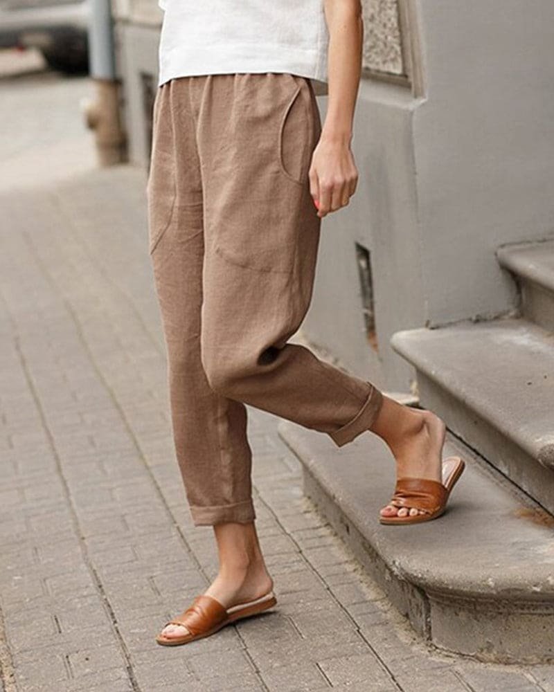 Casual women's tapered linen pants, a comfortable cotton blend with an elastic waist, ideal for summer outfits.