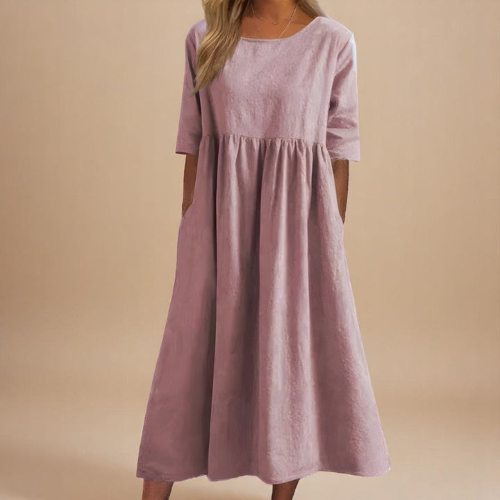 Spring/summer essential: Women's relaxed fit linen midi dress with half-sleeves and elegant gathered waist detail.