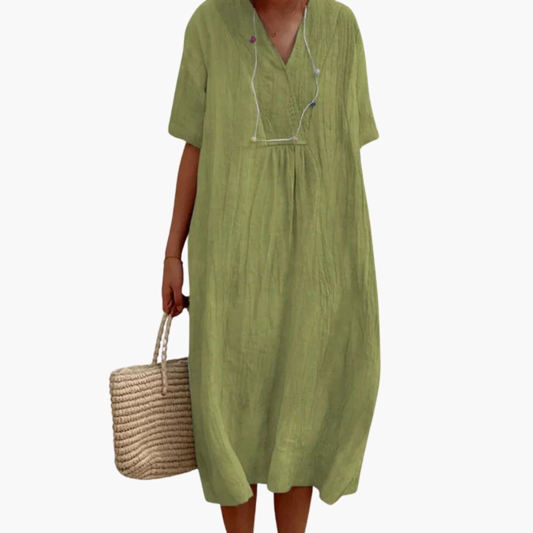 Comfortable relaxed fit women's v-neck midi dress, short sleeve linen design for effortless summer style.