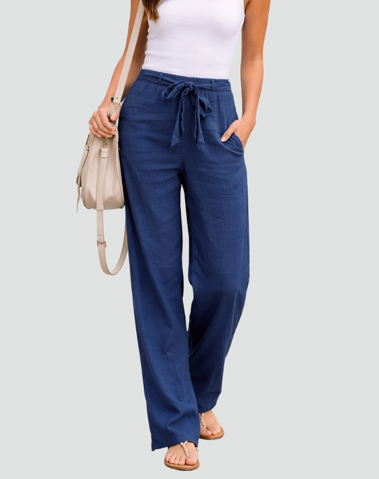 Women's relaxed fit linen wide leg trousers with drawstring waist, ideal for summer comfort & style.