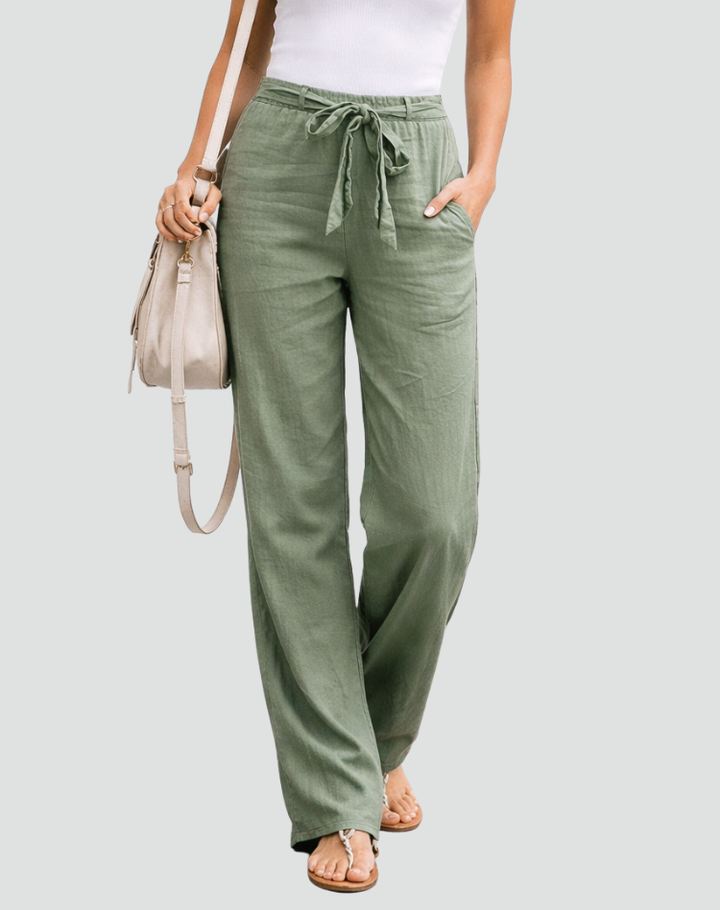 Lightweight women's wide leg linen trousers, perfect for summer casual wear. Relaxed fit & drawstring waist provide comfort.