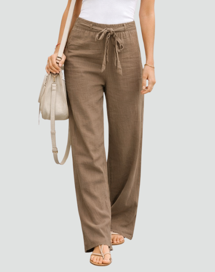 Stylish women's relaxed linen wide leg pants with a comfy drawstring waist, essential for easy everyday summer fashion.