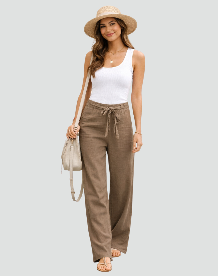 Women's relaxed wide leg linen trousers with drawstring waist. Perfect casual pants for comfortable everyday summer style.