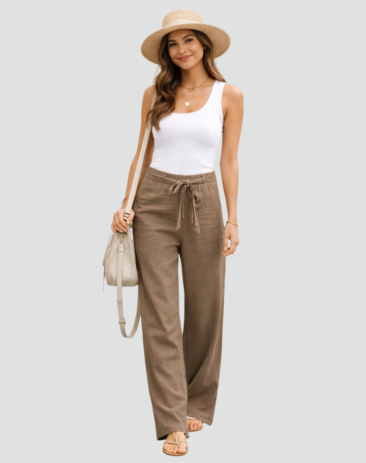Women's relaxed wide leg linen trousers with drawstring waist. Perfect casual pants for comfortable everyday summer style.