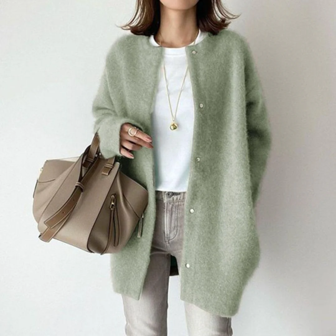Women's relaxed fit long cardigan sweater, a cozy layering piece for effortless casual style, perfect for fall.