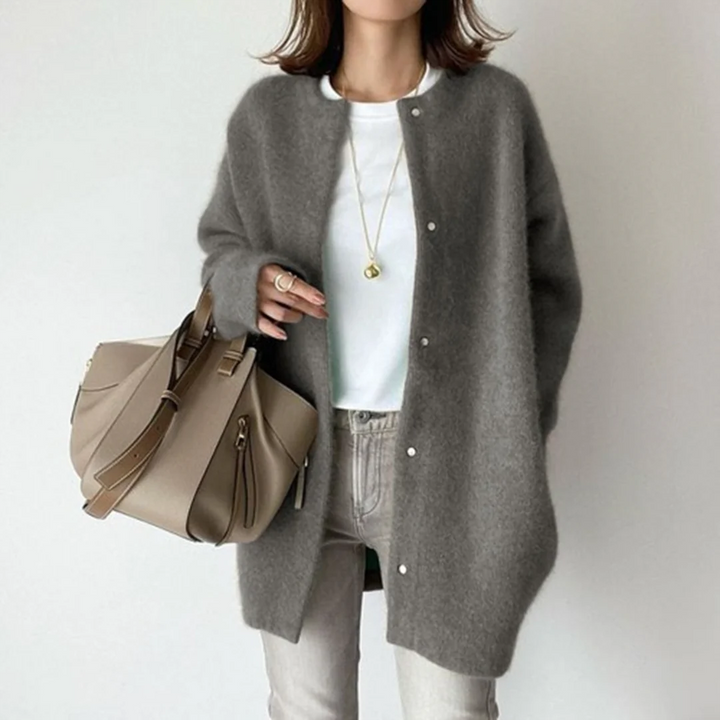 Soft, comfortable knee-length women's long cardigan sweater with relaxed fit, ideal for cozy fall and winter layering.