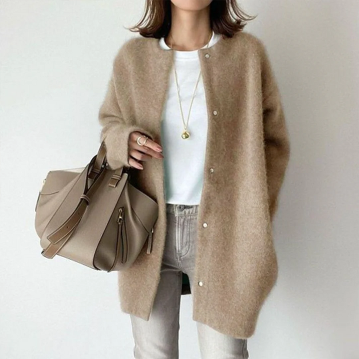 Comfortable women's long cardigan sweater with a relaxed fit, an essential cozy layering piece for everyday wear.