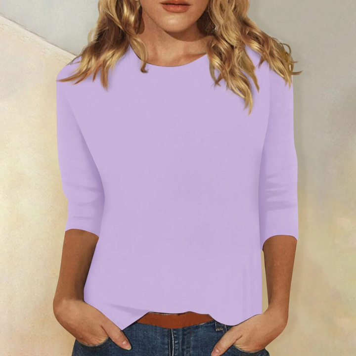 Stylish women's long sleeve top with a relaxed fit and classic round neck, ideal for casual fashion.