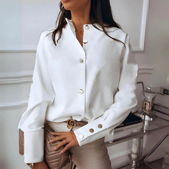Chic women's long sleeve button-down shirt with a relaxed fit. Perfect for casual wear or office layering.