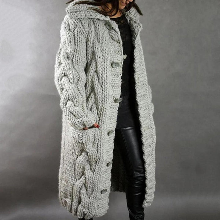 Textured, cozy women's knit coat featuring a relaxed long sleeve fit and open front, great for layering.