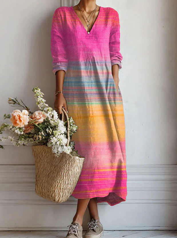 Women's relaxed fit long sleeve midi dress with pockets. Ideal for everyday, casual, and effortless spring/summer style.