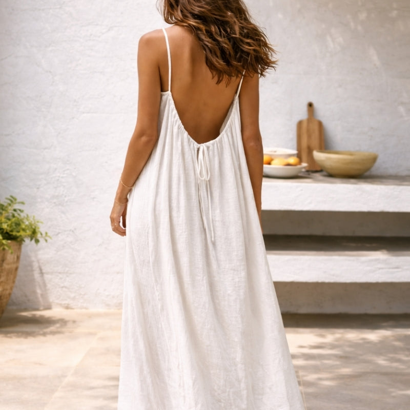 Flowy sleeveless summer dress for women, ideal as a casual beach or vacation outfit.