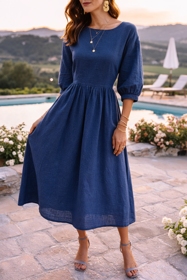 Versatile women's smock dress. Relaxed fit maxi, 3/4 sleeves, round neck. Ideal for casual comfort.