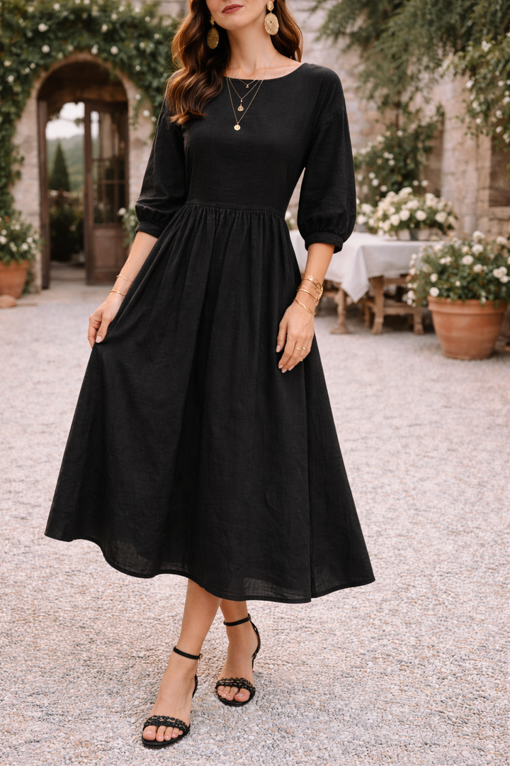 Chic women's smock maxi dress, relaxed fit for ultimate comfort. Features 3/4 sleeves, round neck, & pockets.