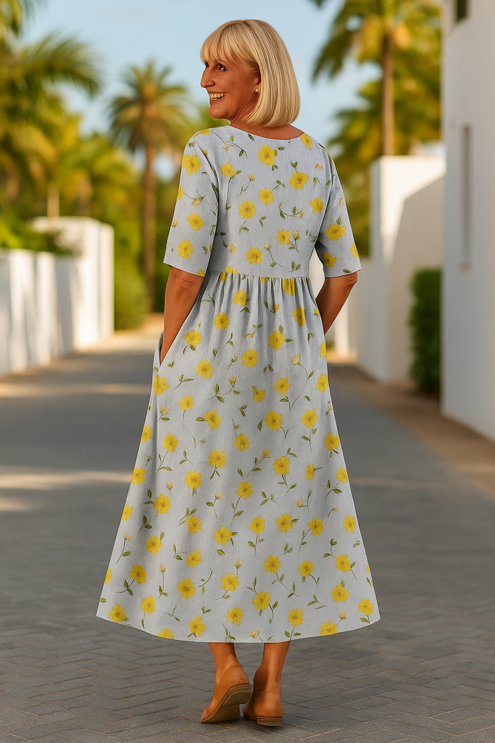 Flowy women's midi dress with 3/4 sleeves, designed for relaxed, comfortable, and elegant casual style.