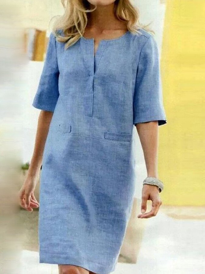 Women's relaxed fit midi dress with a stylish notch neck, perfect for casual everyday wear.