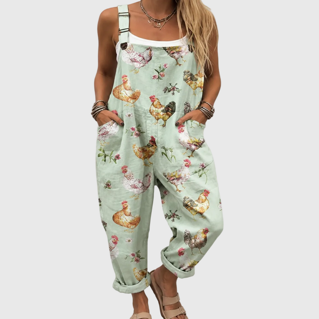 Women's relaxed fit pastel jumpsuit with cute chicken & floral print, perfect for comfortable casual summer wear.