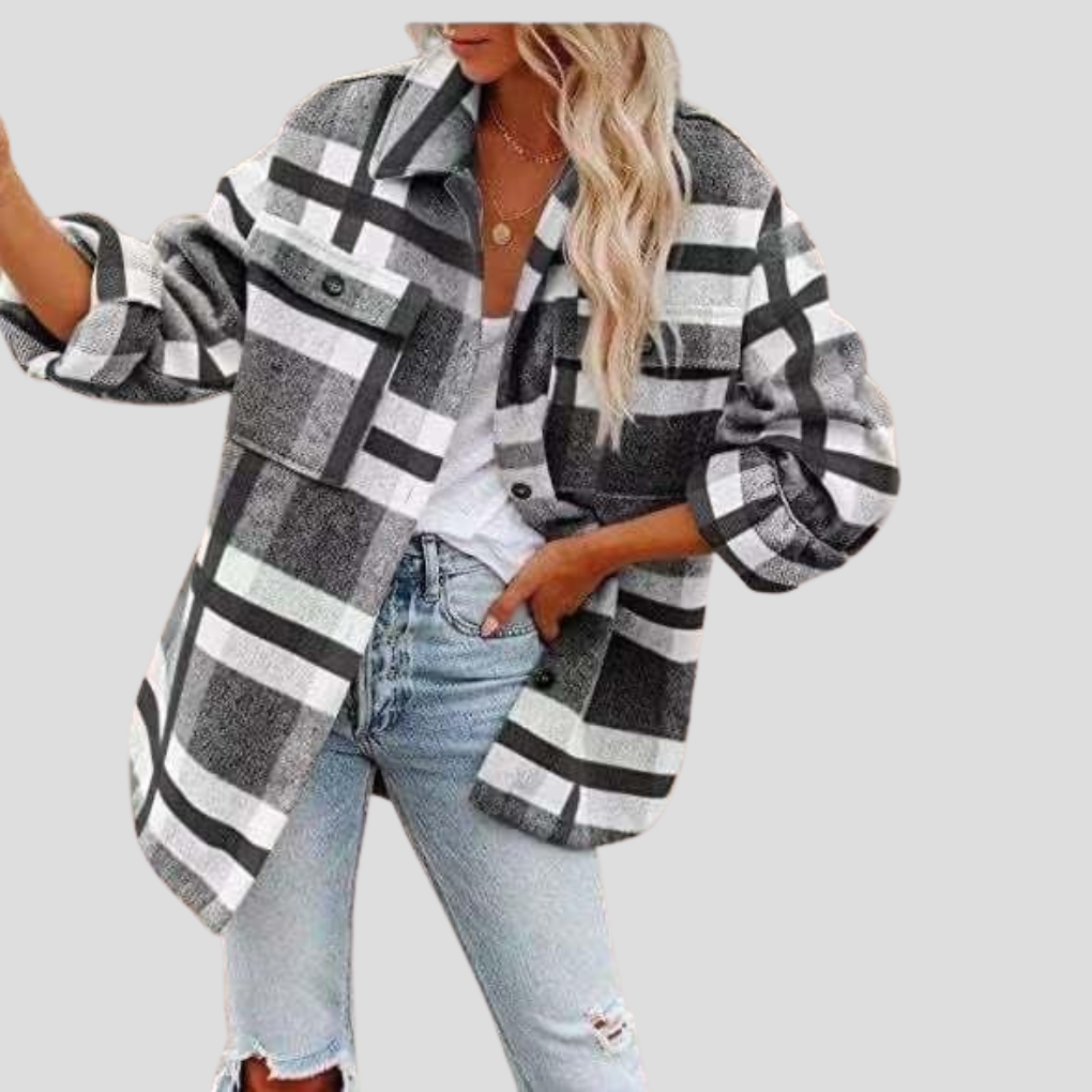 Relaxed fit women's plaid overshirt, a casual long sleeve button-up. Ideal checked top for comfortable layering.