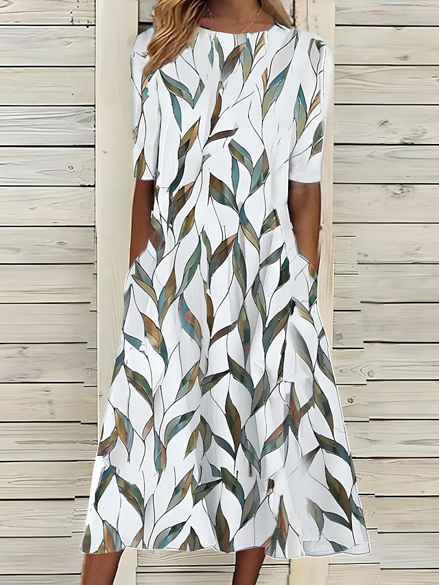 Comfortable women's casual printed midi dress. Versatile short sleeve design, ideal for summer or everyday wear.