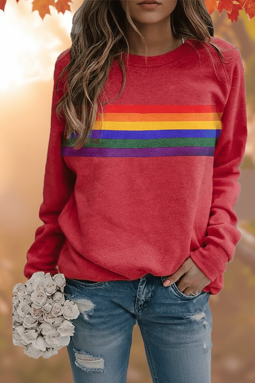 Women's relaxed-fit rainbow striped crew-neck jumper for casual wear.