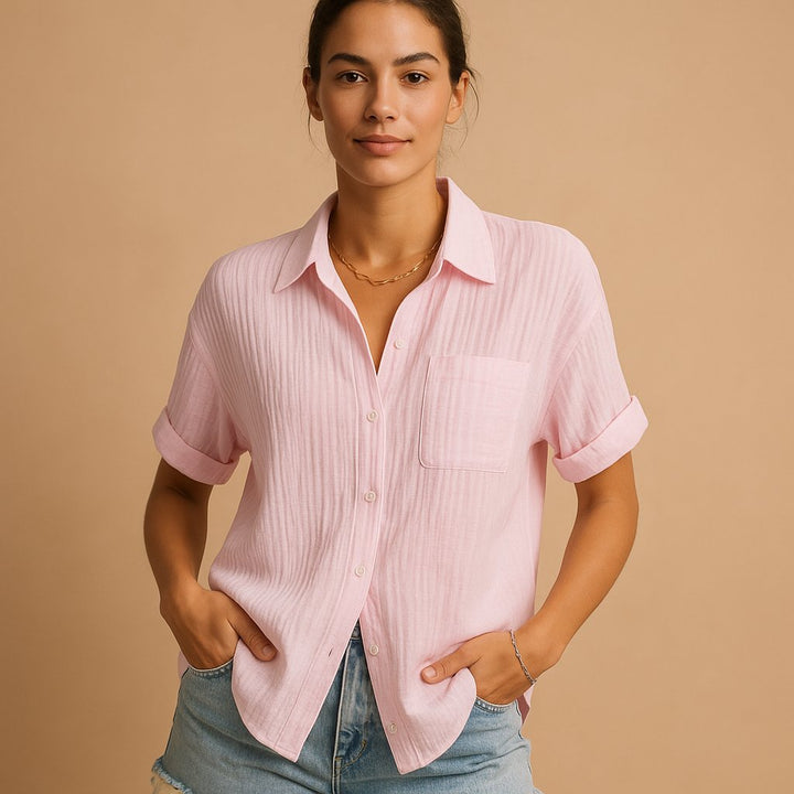 Stylish women's short sleeve summer top, relaxed fit button-down for casual everyday wear and comfort.